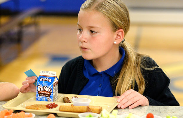 GRACE student enjoys hot lunch in the cafeteria