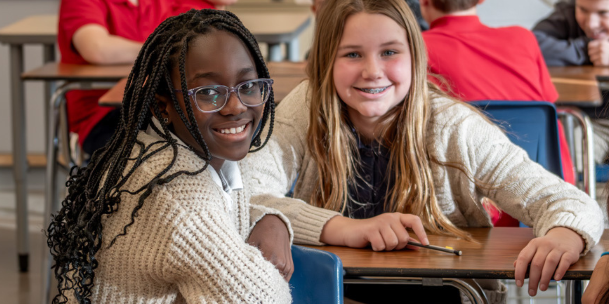 GRACE students sitting at desks